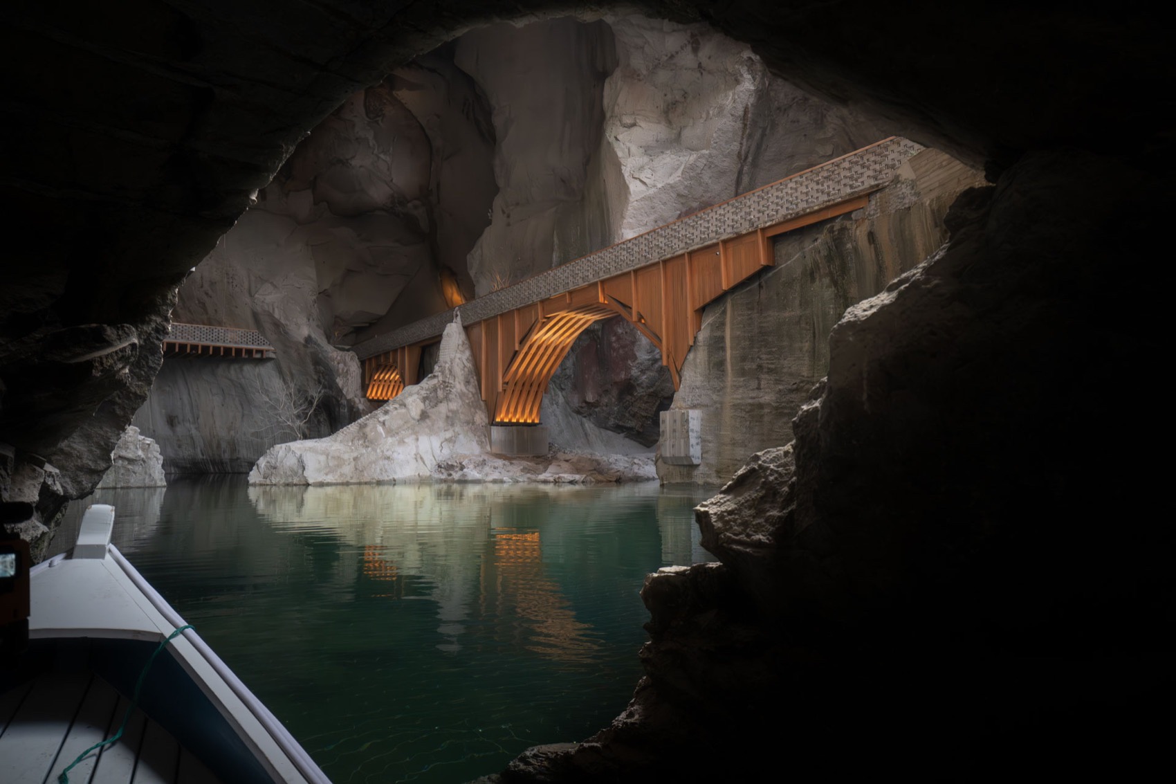 Timber bridge reflected in the quarry pool