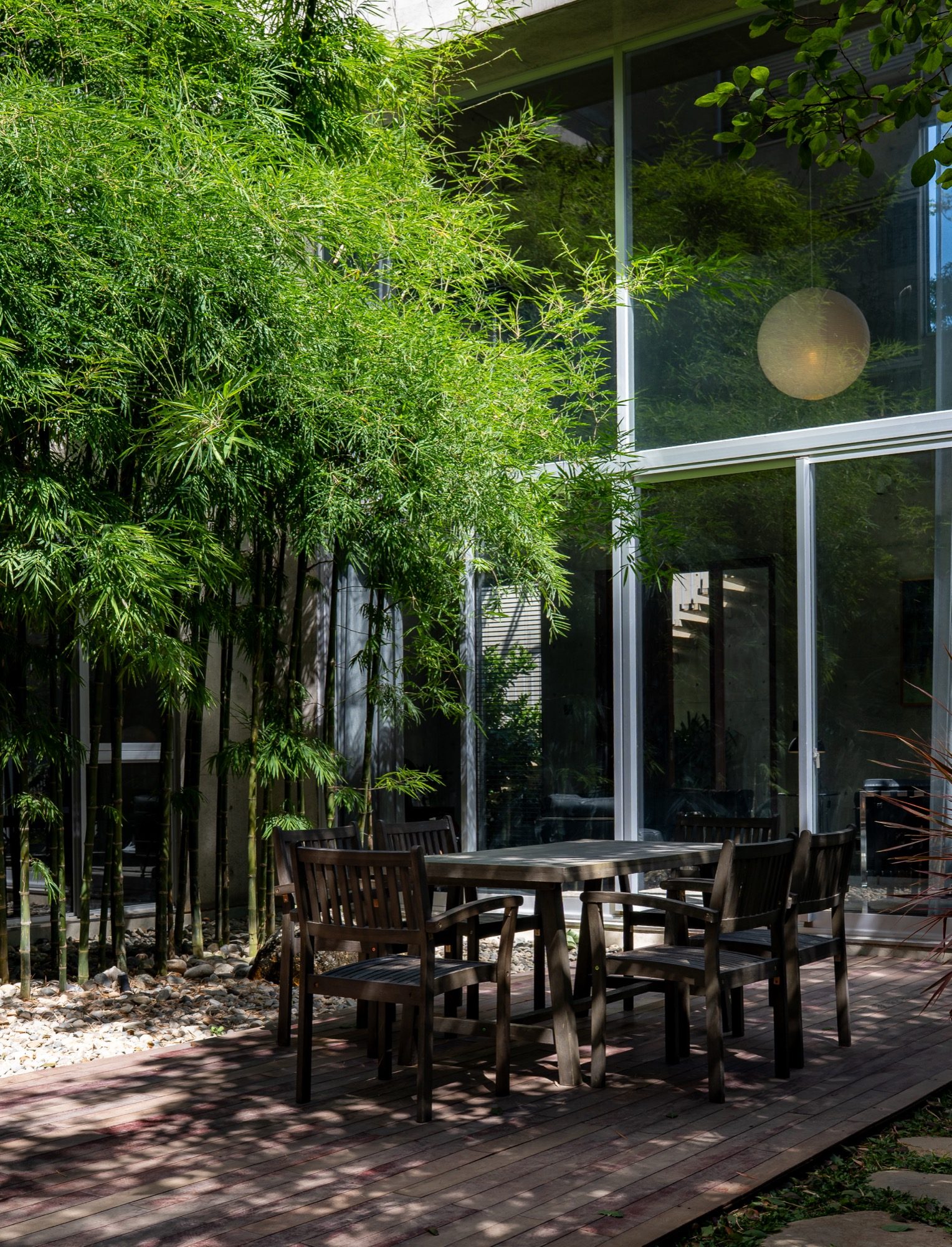 Courtyard dining among bamboo