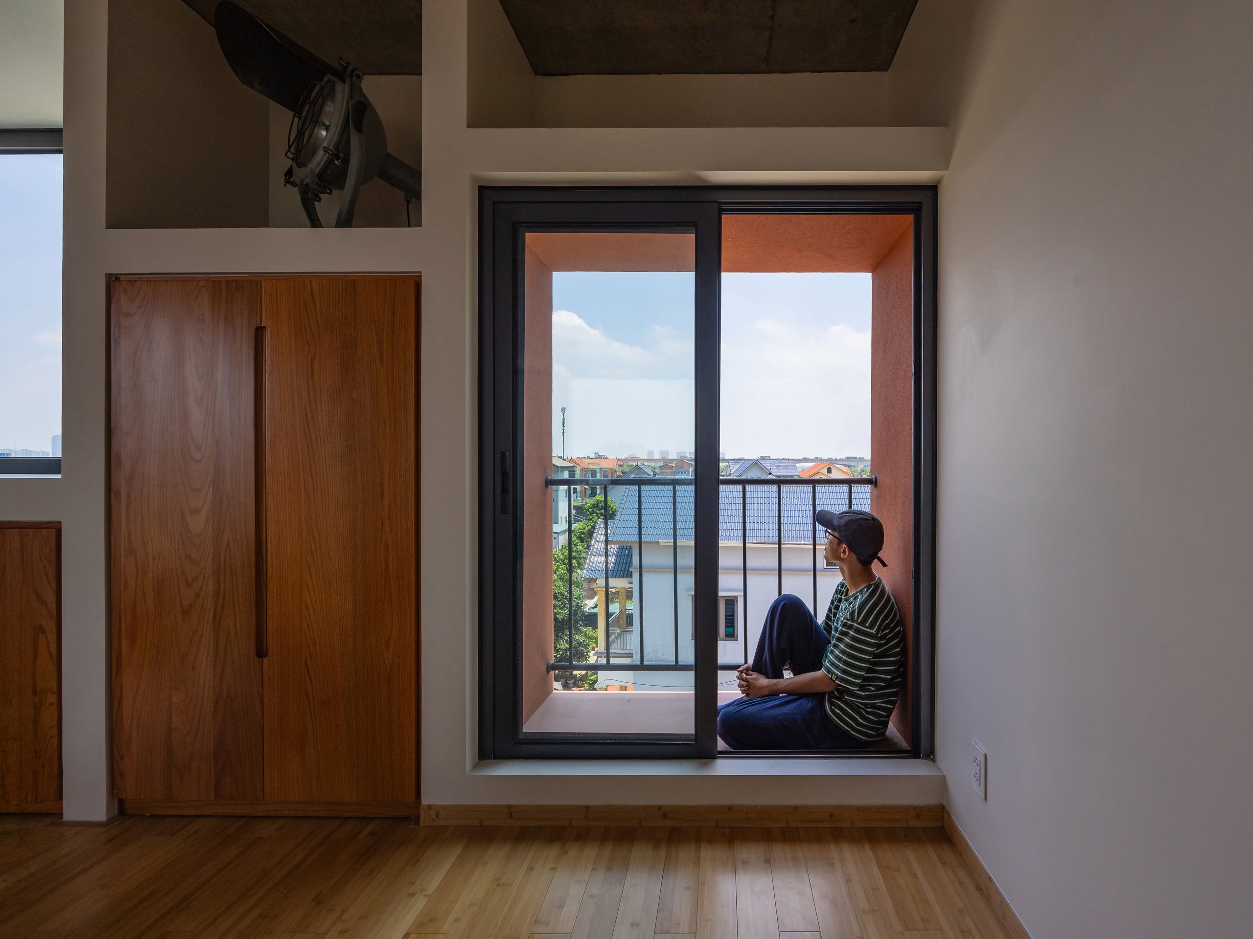 100 Windows by Inrestudio, Hanoi, deep window on the fourth floor