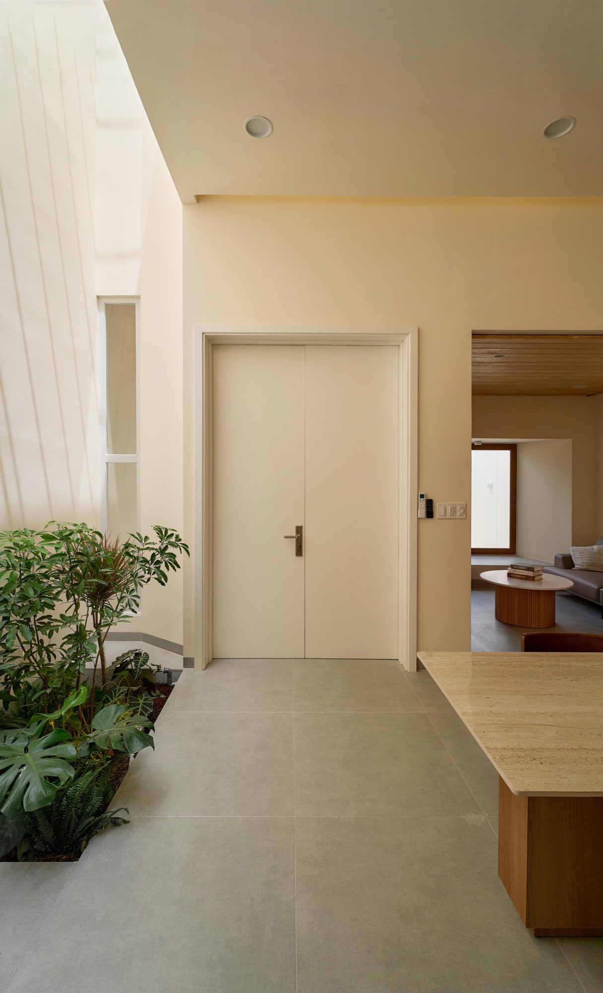 Entry hall with planting beside the door