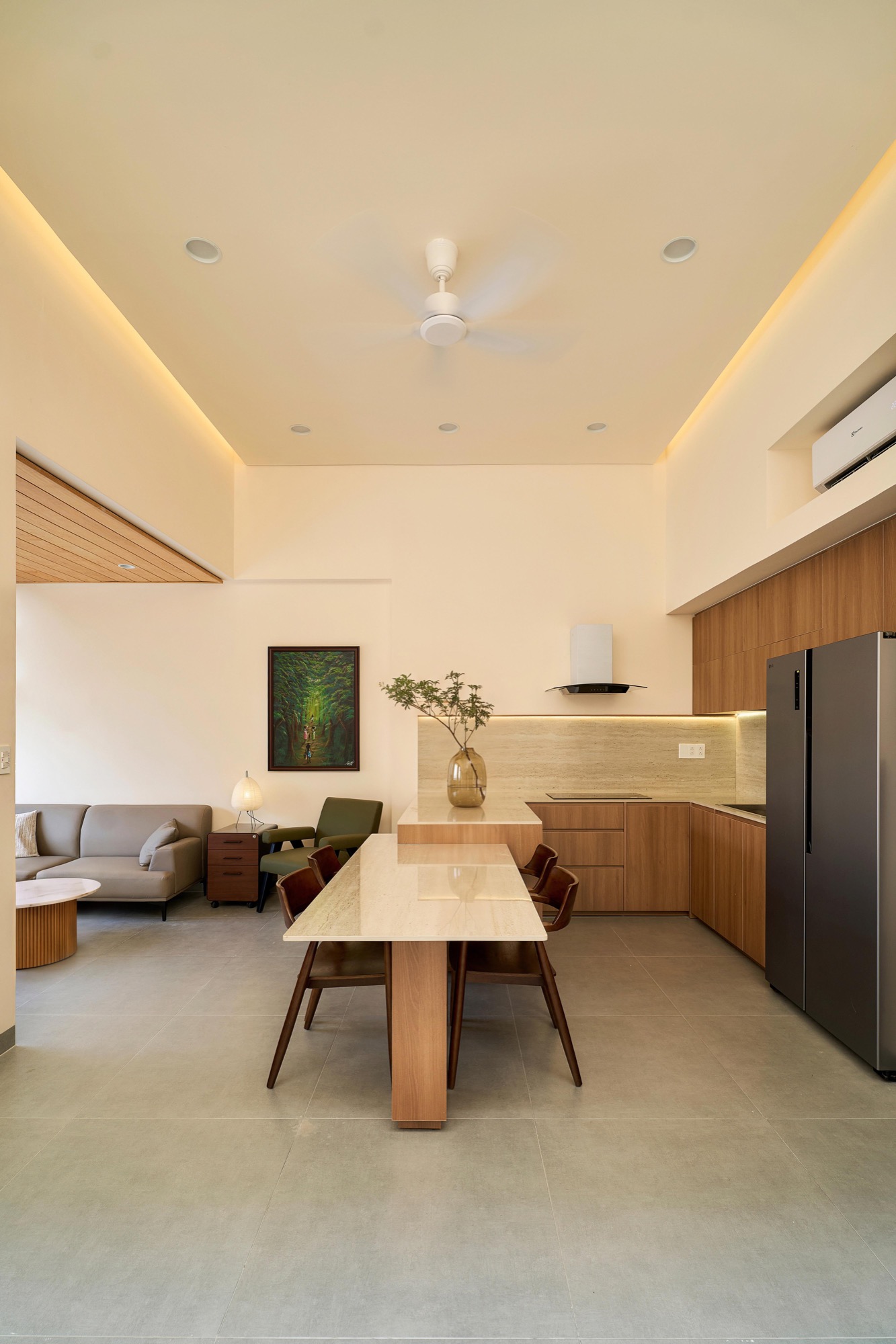 Kitchen and dining area under a stepped ceiling