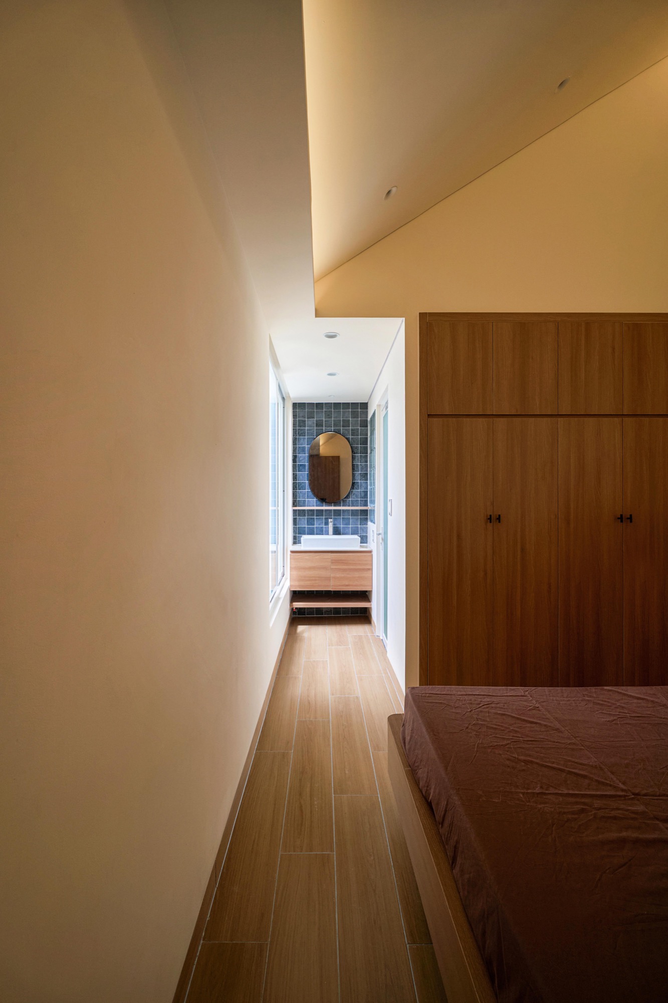 Timber-floored corridor along the bedrooms