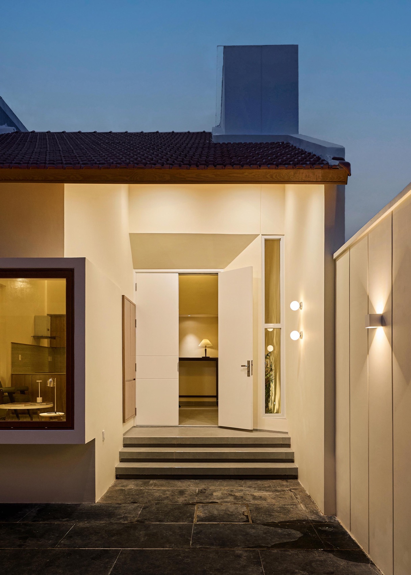 Lit entrance at dusk