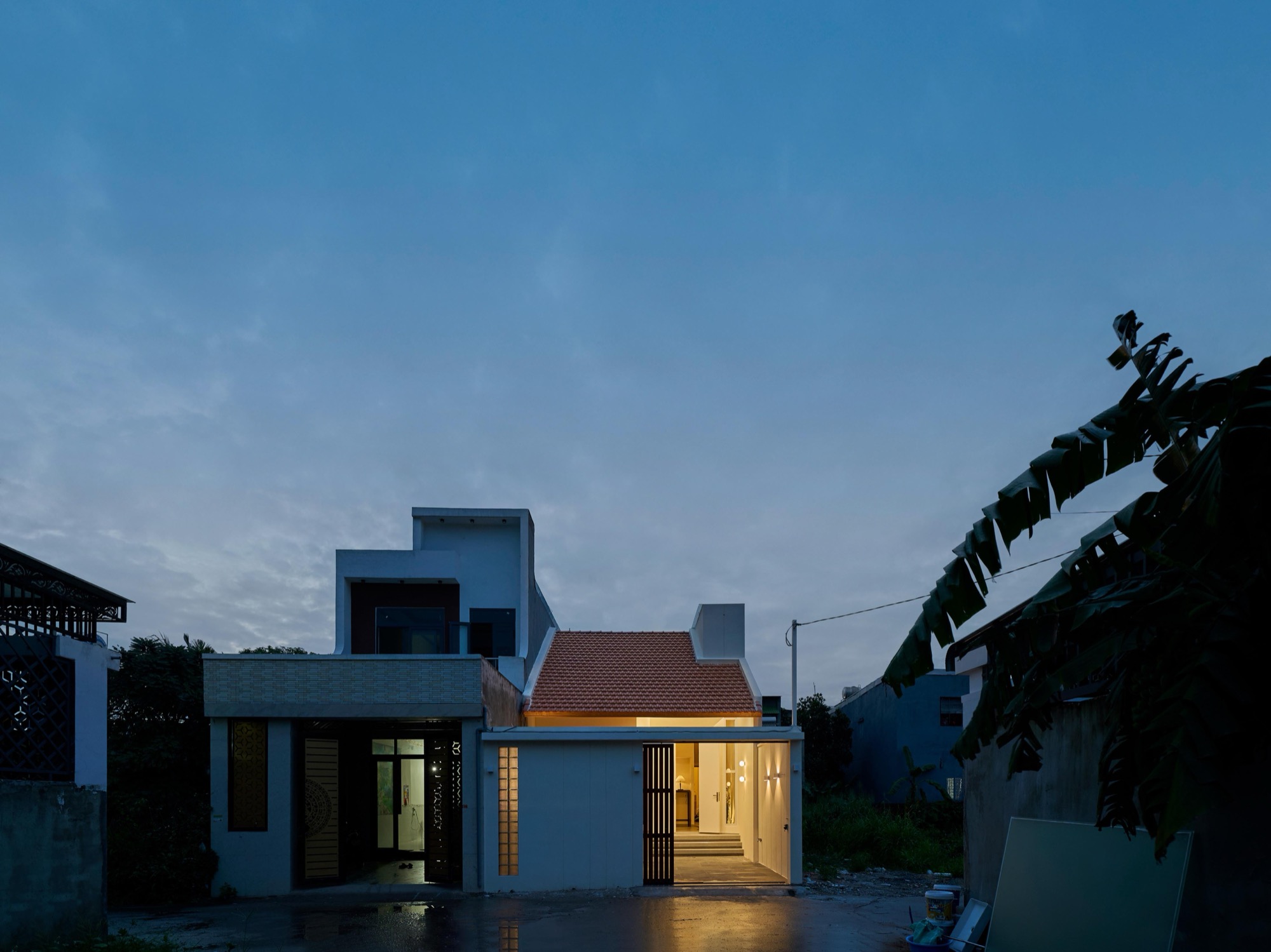 The house among trees at dusk