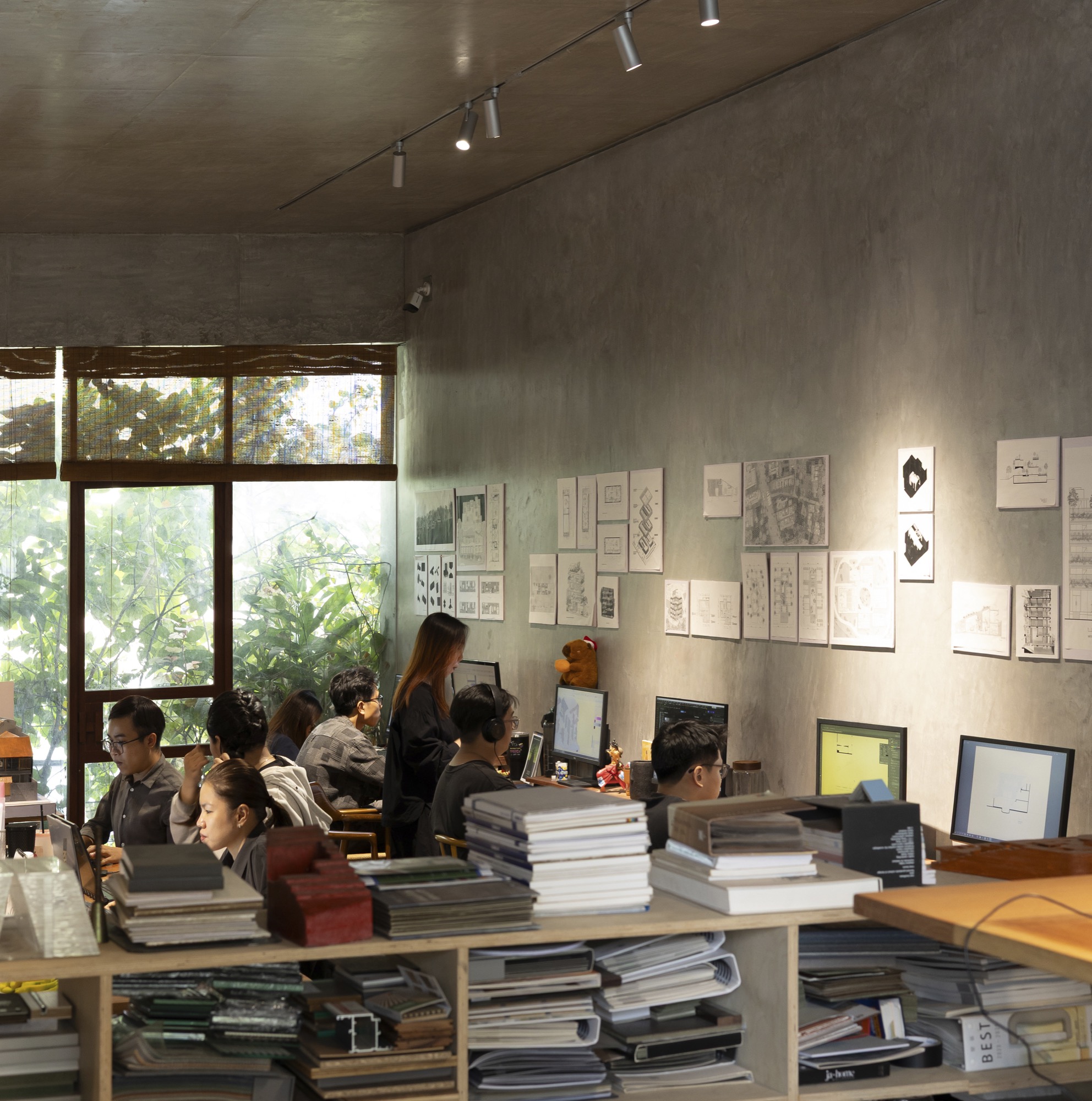 Studio desks facing the planted façade