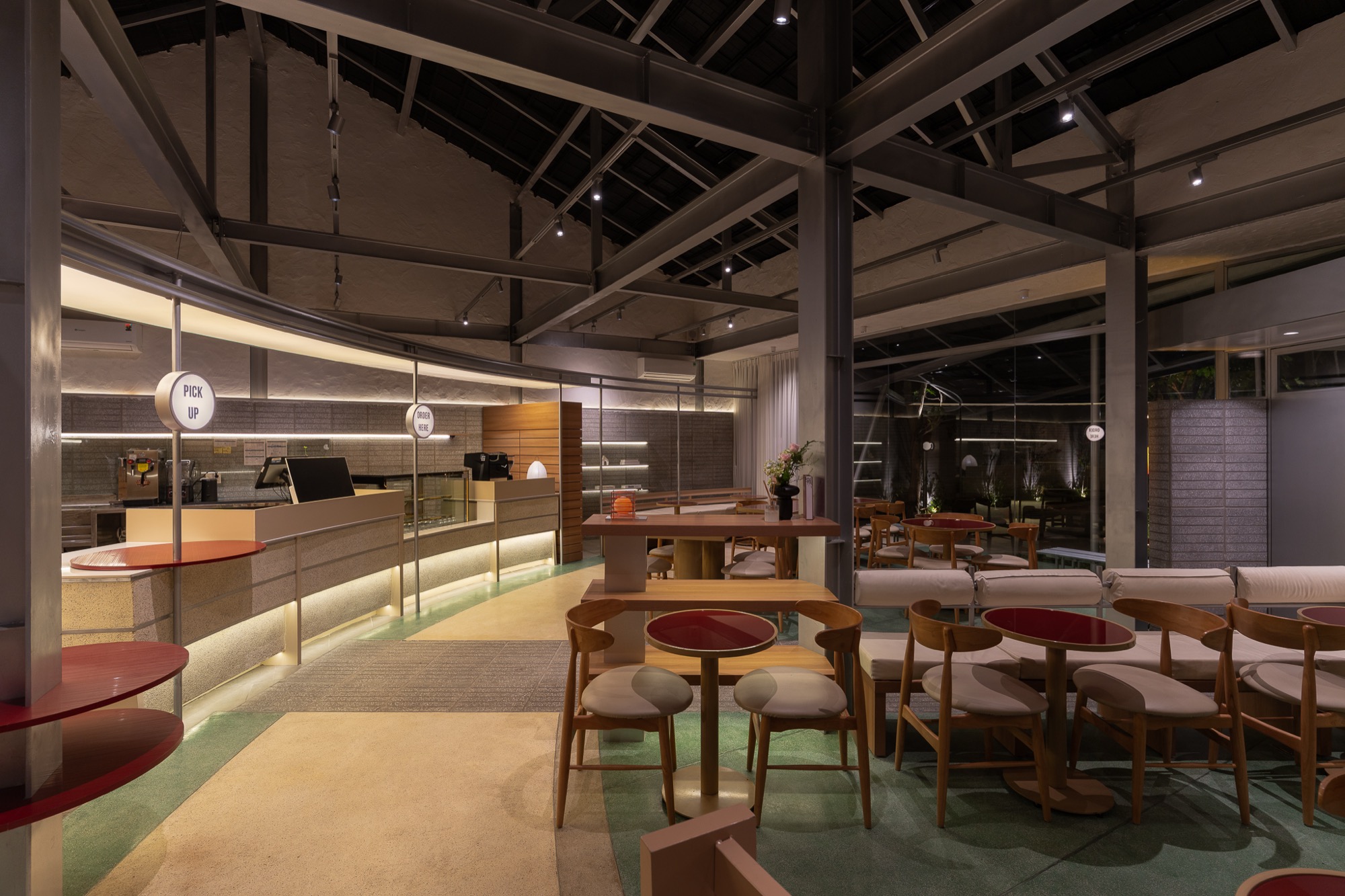 Bar and seating under the exposed steel roof