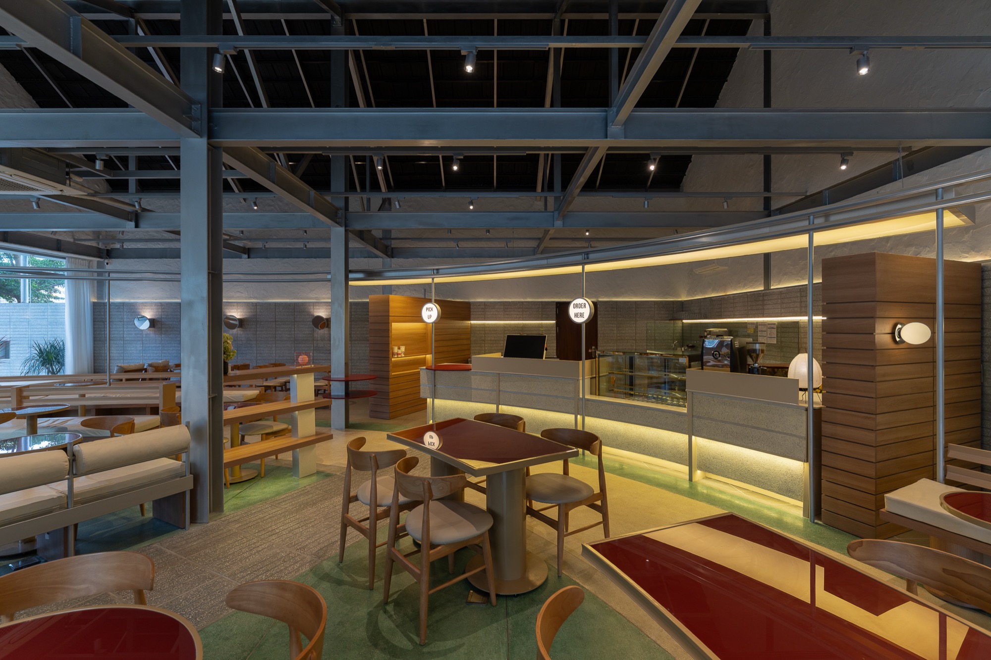 Bar counter and tables under the steel roof