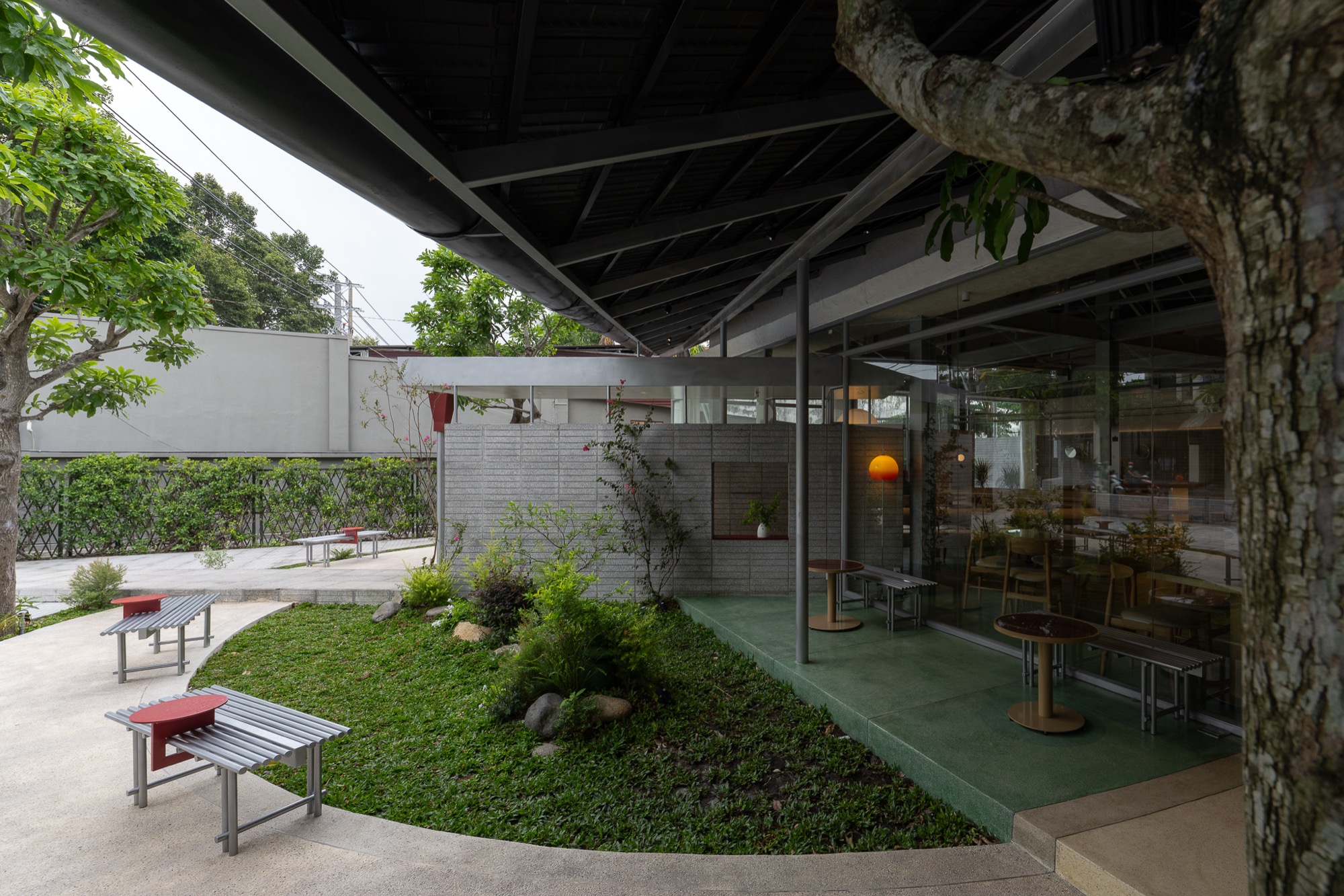 Lawn inside the ring, with the café beyond