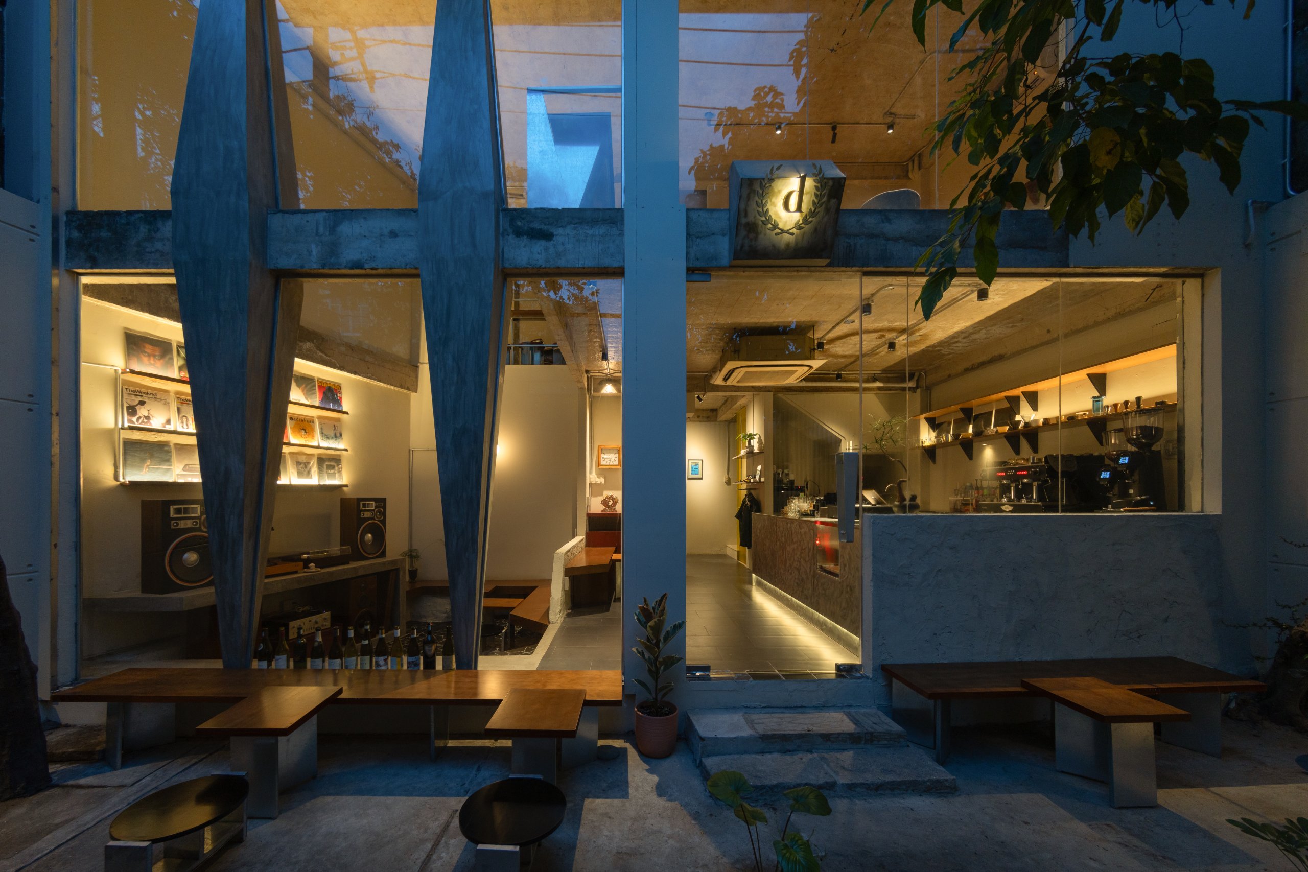 Day1 Cafe by oh.hi studio, the café at dusk seen from the courtyard