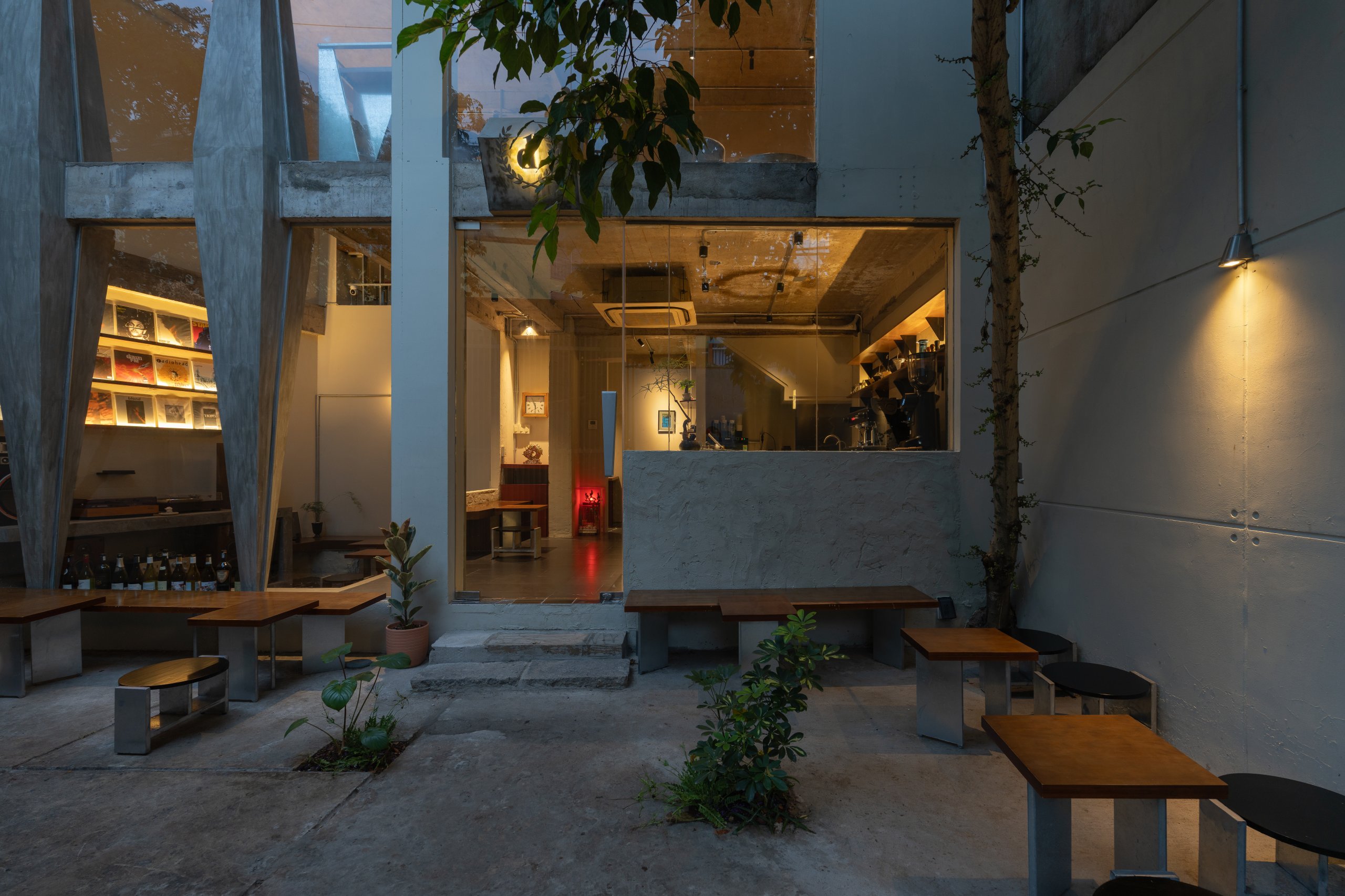 Day1 Cafe by oh.hi studio, courtyard seating looking into the café