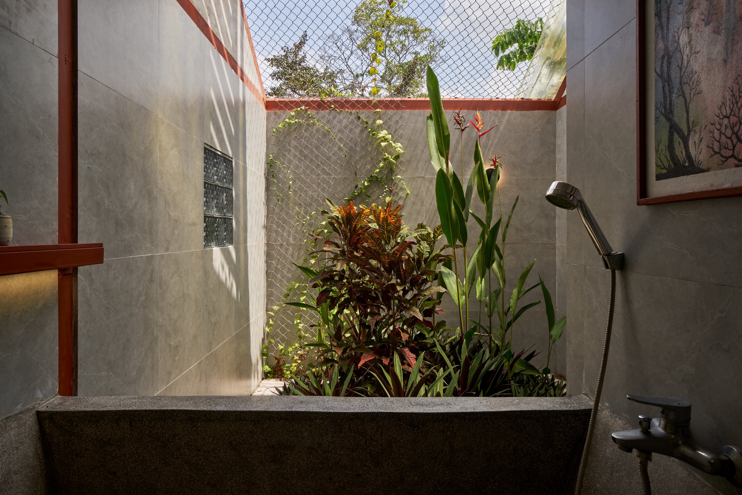 Garden House by aha.studio.arc, Go Quao, An Giang, garden inside the bathroom block