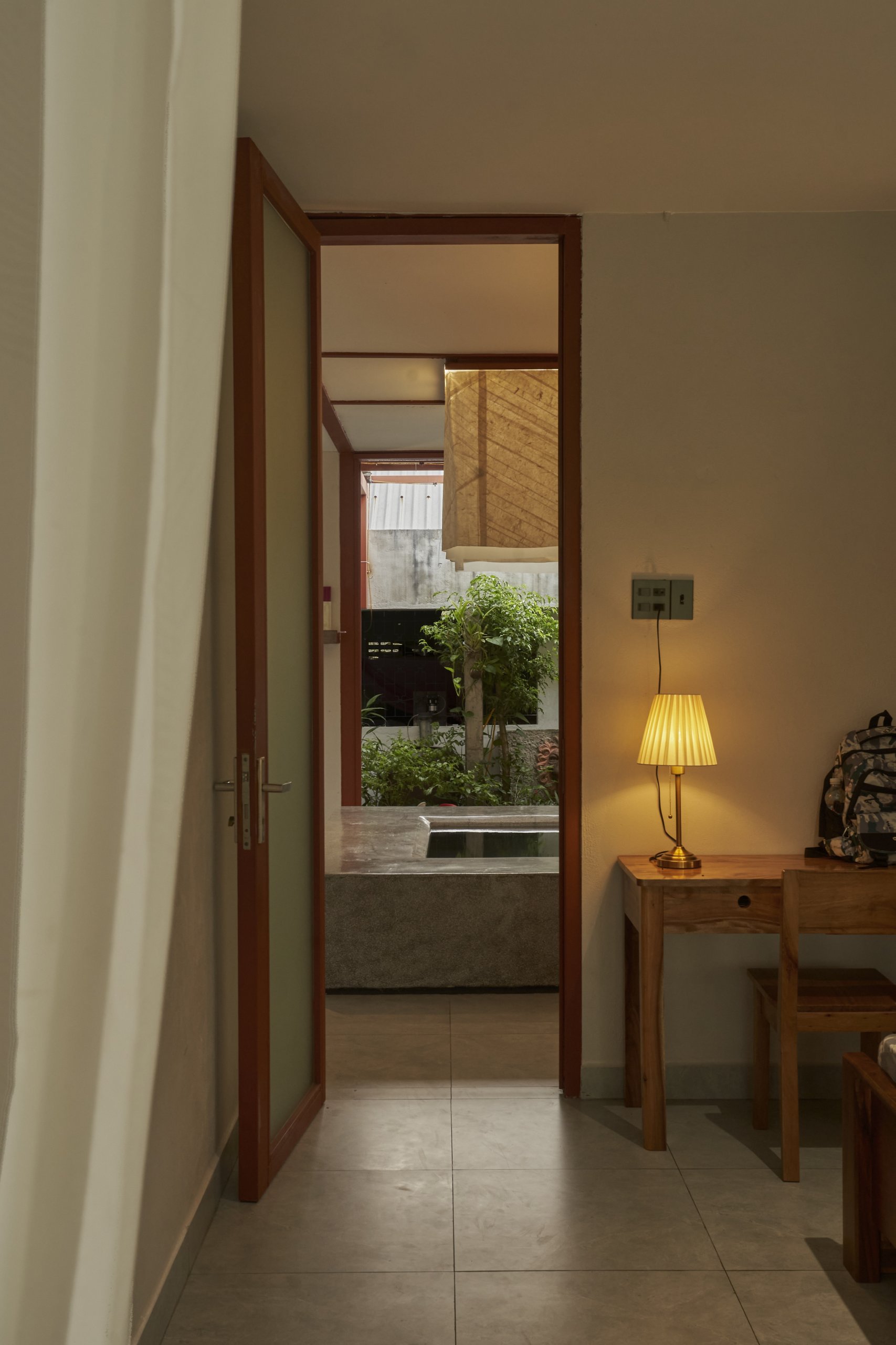 Garden House by aha.studio.arc, Go Quao, An Giang, bedroom doorway