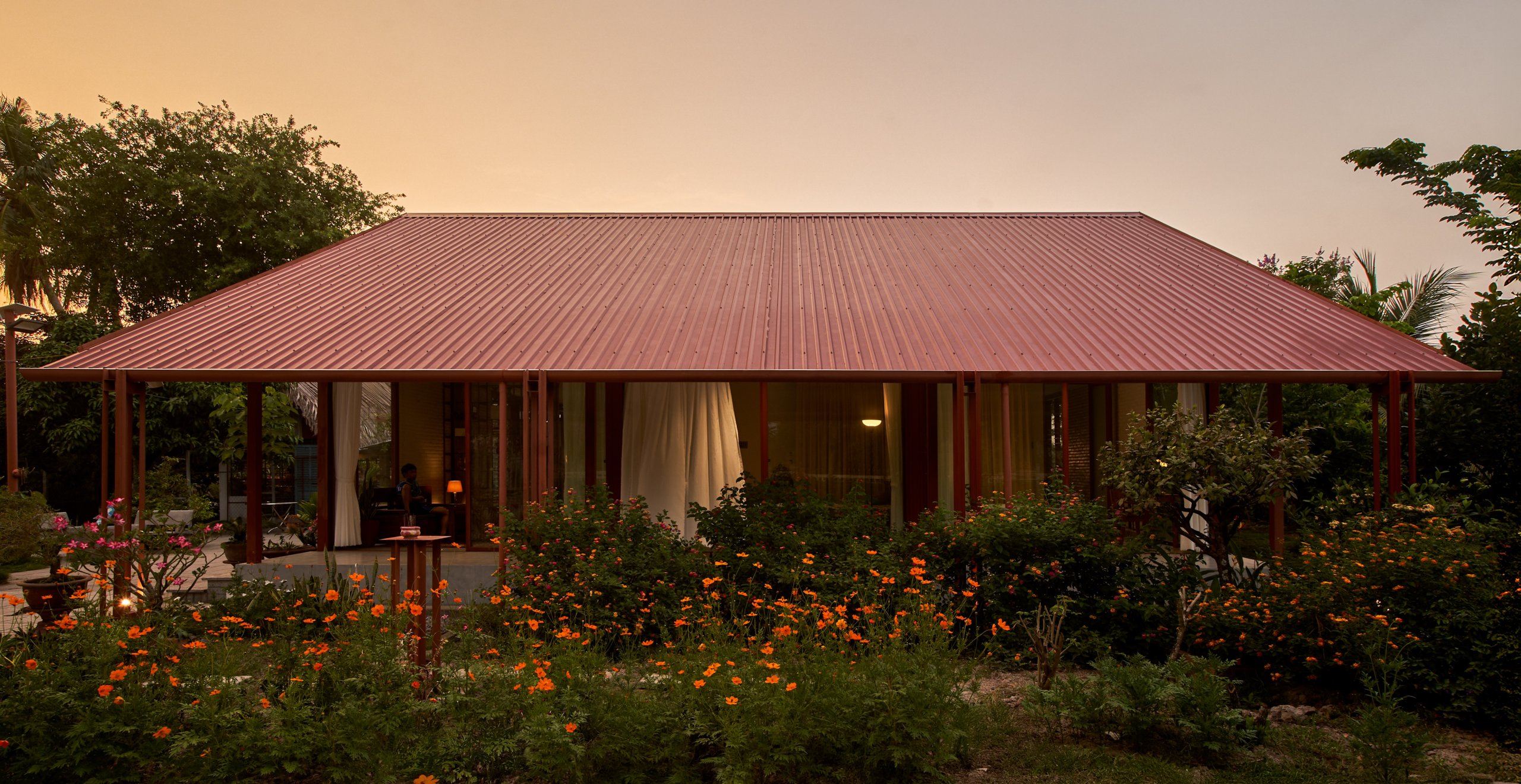 Garden House by aha.studio.arc, Go Quao, An Giang, the house in late afternoon light