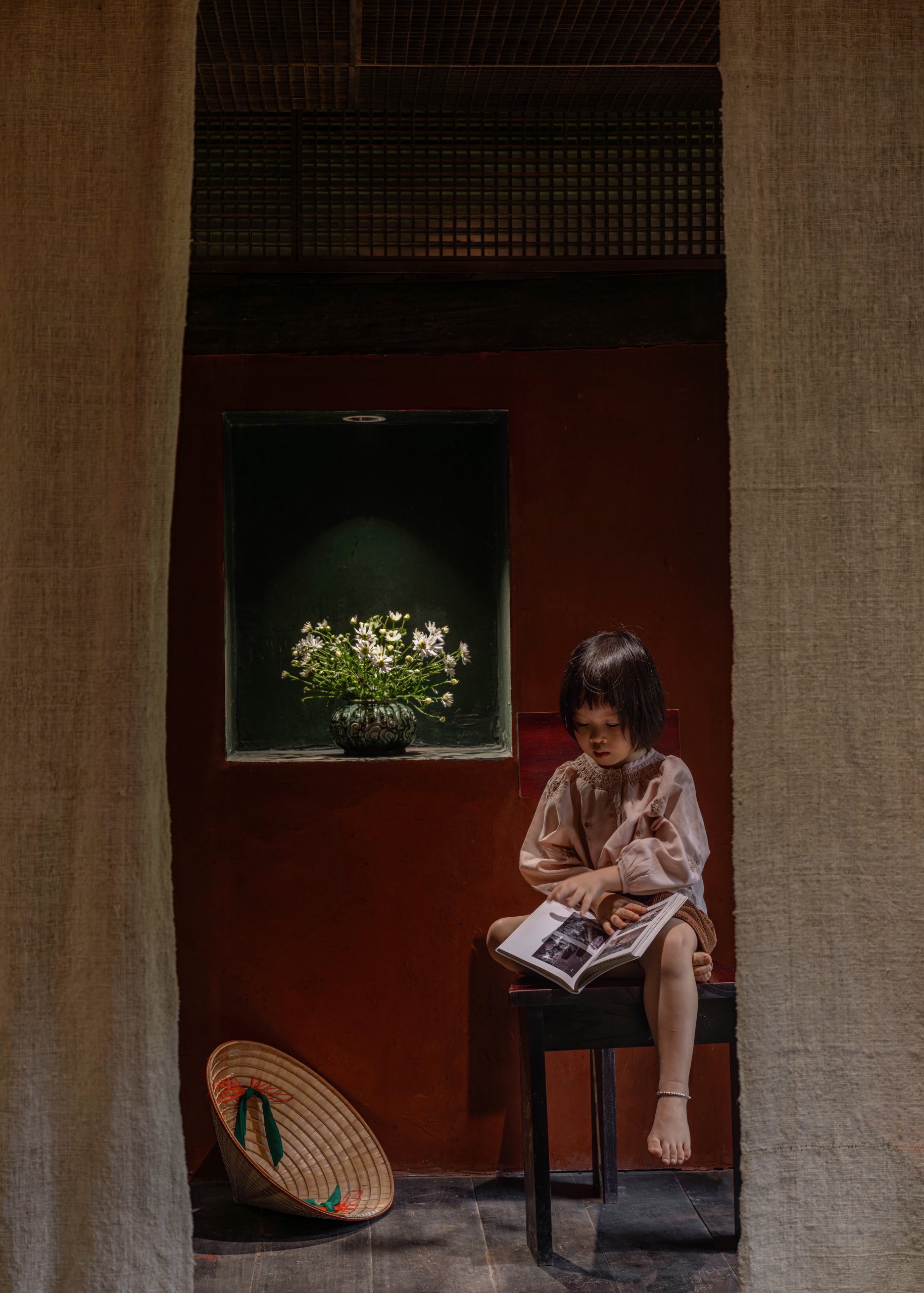 Window seat with carved heritage fragment