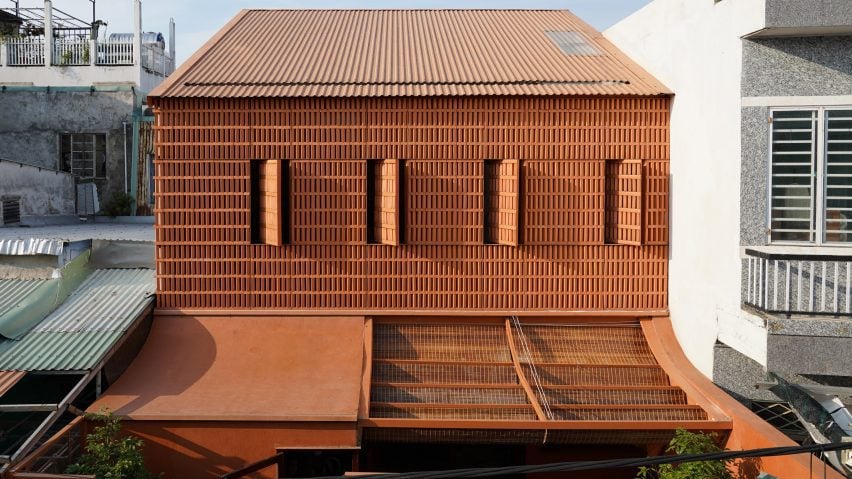 Perforated brick screen filtering the microclimate of Terracotta Breath